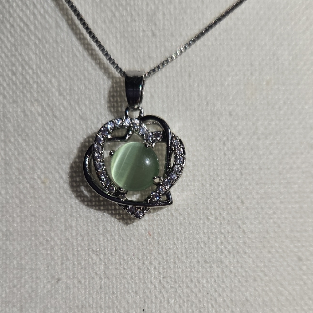 Elegant Diamond Heart Pendant Necklace with Green Gemstone